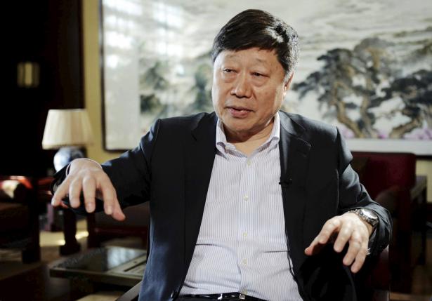 Zhang Ruimin, CEO of Haier Group, gestures during an interview with Reuters in his office, at Haier's headquarters in Qingdao, Shandong province, China, March, 20, 2014.  REUTERS/China Daily